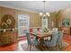 Elegant dining room featuring a stylish chandelier and hardwood floors at 1000 Eddie Craig Dr, Mcdonough, GA 30252