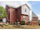Exterior of a brick house showing a well-maintained yard at 1000 Eddie Craig Dr, Mcdonough, GA 30252