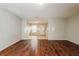 Open living room with hardwood floors and view of the entry area with tile flooring at 1211 Brookstone Rd, Atlanta, GA 30349