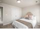 Neutral bedroom with carpet, a double-door closet, and a comfortable-looking bed at 4220 Cavalier Way, Duluth, GA 30097