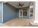 Covered back porch with a ceiling fan and a view of the backyard at 131 Old Alabama Se Rd, Emerson, GA 30137