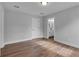 This bedroom features wood flooring and an attached ensuite at 131 Old Alabama Se Rd, Emerson, GA 30137