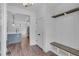 Welcoming foyer with a built-in bench, storage, and view of the modern kitchen at 131 Old Alabama Se Rd, Emerson, GA 30137