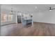 Open-concept living space with a modern kitchen featuring a large island and stainless steel appliances at 131 Old Alabama Se Rd, Emerson, GA 30137