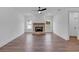 Bright living room featuring a brick fireplace, hardwood floors, and modern lighting at 131 Old Alabama Se Rd, Emerson, GA 30137