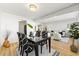 Staged living room with hardwood floors and open floor plan at 215 Piedmont Ne Ave # 308, Atlanta, GA 30308