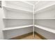 Walk-in pantry featuring shelves and tan flooring at 215 Piedmont Ne Ave # 308, Atlanta, GA 30308