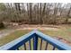Backyard view from deck overlooking creek and trees at 2321 Birdie Ln, Duluth, GA 30096