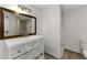 Updated bathroom vanity features a mirror and bright lighting at 2321 Birdie Ln, Duluth, GA 30096