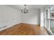 Bright dining room with hardwood floors, white walls, and natural light at 2321 Birdie Ln, Duluth, GA 30096
