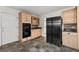 Kitchen with double oven, stainless steel refrigerator and light colored cabinets at 2321 Birdie Ln, Duluth, GA 30096