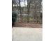 A view of the backyard with a fence at 2394 Elkhorn Ter, Duluth, GA 30096