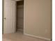 Bedroom closet offers ample storage with its built-in shelving and bright interior at 2394 Elkhorn Ter, Duluth, GA 30096