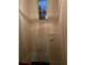 Second floor hallway with bright natural light, showing closet and emergency exit at 2394 Elkhorn Ter, Duluth, GA 30096