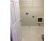 Functional laundry room provides connections for appliances and a bright, clean space at 2394 Elkhorn Ter, Duluth, GA 30096