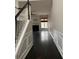 Inviting living room with hardwood floors, decorative molding, and a cozy fireplace at 2394 Elkhorn Ter, Duluth, GA 30096