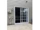 Exterior sliding glass door to the patio provides seamless indoor and outdoor living at 2394 Elkhorn Ter, Duluth, GA 30096