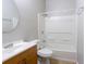 Bathroom with a vanity, mirror, and shower-tub combo at 11338 Musette Cir, Alpharetta, GA 30009