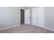 Bedroom featuring neutral paint, carpet, and a closet at 11338 Musette Cir, Alpharetta, GA 30009