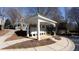 Mailbox station with shelter and trash receptacle in a well-maintained community area at 11338 Musette Cir, Alpharetta, GA 30009