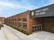 Gwinnett County Public Library building featuring a brick exterior and large windows at 3701 W Lawrenceville St, Duluth, GA 30096