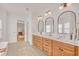 Bathroom featuring double sinks and framed mirrors at 1527 Markan Ne Dr, Atlanta, GA 30306