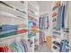 Walk-in closet with custom shelving, providing ample storage and organization for clothes and accessories at 1527 Markan Ne Dr, Atlanta, GA 30306