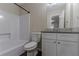 Bathroom featuring a granite countertop vanity and shower/tub combo at 3174 Palm Tree Dr, Lithonia, GA 30038