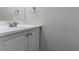 Bathroom vanity featuring white cabinets and a granite countertop at 3174 Palm Tree Dr, Lithonia, GA 30038