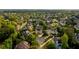 Aerial view of a beautiful residential neighborhood surrounded by lush green trees at 608 Goldsmith Ct # 113, Johns Creek, GA 30022