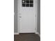 Interior door with window inset and dark trim at 7382 Knox Bridge Hwy, Canton, GA 30114