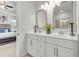 Clean bathroom showcases double sinks and modern decor at 7438 Jennadee Dr, Fairburn, GA 30213