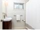 Bathroom featuring tile flooring, a shower and a white vanity sink at 100 Biscayne Nw Dr # 4, Atlanta, GA 30309