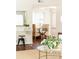 A bright entryway featuring a clear console table and a view of a dining nook at 100 Biscayne Nw Dr # 4, Atlanta, GA 30309