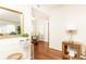 Bright hallway leading to the dining area with hardwood floors and neutral walls at 100 Biscayne Nw Dr # 4, Atlanta, GA 30309