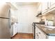 Well-equipped kitchen featuring stainless steel appliances and granite countertops at 100 Biscayne Nw Dr # 4, Atlanta, GA 30309