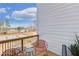 Charming balcony with comfortable seating and scenic views, perfect for relaxing outdoors at 220 Village Overlook # K2, Canton, GA 30114