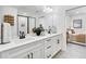 Elegant bathroom featuring a double vanity with white cabinets, modern fixtures, and a clean design at 220 Village Overlook # K2, Canton, GA 30114