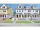 Charming exterior view of newly built townhomes with white exteriors and inviting front yards at 220 Village Overlook # K2, Canton, GA 30114
