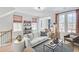 Comfortable living room showcasing large windows, a cozy seating area, and stylish window coverings at 220 Village Overlook # K2, Canton, GA 30114