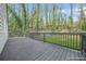 Expansive wooden deck perfect for entertaining or enjoying the serene backyard view at 437 Westmeath Sw Dr, Atlanta, GA 30310