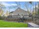 Spacious backyard with well-maintained lawn, and a large wooden deck at 437 Westmeath Sw Dr, Atlanta, GA 30310