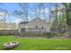 Charming backyard with well-maintained lawn, fire pit, and a spacious deck at 437 Westmeath Sw Dr, Atlanta, GA 30310