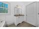Bright bathroom with double vanity, granite countertops, and updated fixtures provides comfort at 437 Westmeath Sw Dr, Atlanta, GA 30310