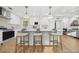 Stylish kitchen with a center island, stainless steel appliances, and convenient bar stool seating at 437 Westmeath Sw Dr, Atlanta, GA 30310