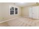 Neutral bedroom with plush carpeting and a large window for natural light at 3119 Windfield Cir, Tucker, GA 30084