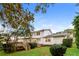 View of the back of the home showing the deck, fenced yard and other exterior details at 3119 Windfield Cir, Tucker, GA 30084