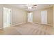 Large main bedroom with ensuite bathroom and neutral tones at 3119 Windfield Cir, Tucker, GA 30084