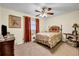 Bedroom featuring a ceiling fan, curtains, and carpeted floors at 3354 Wakefield Dr, Decatur, GA 30034