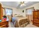 Bedroom featuring a ceiling fan, curtains, and carpeted floors at 3354 Wakefield Dr, Decatur, GA 30034